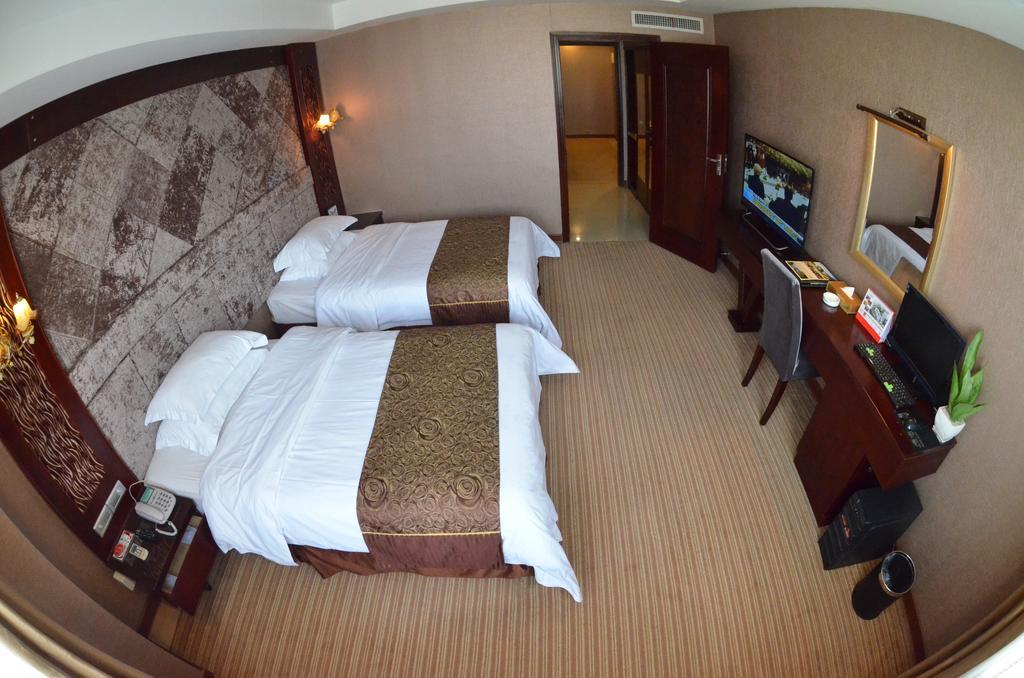 Xiamen Wanjia Oriental Hotel Kamer foto